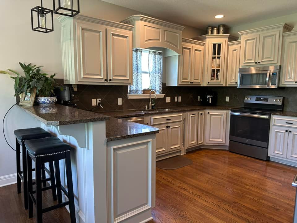Amazing new light gray color for these cabinets in Olathe Ks