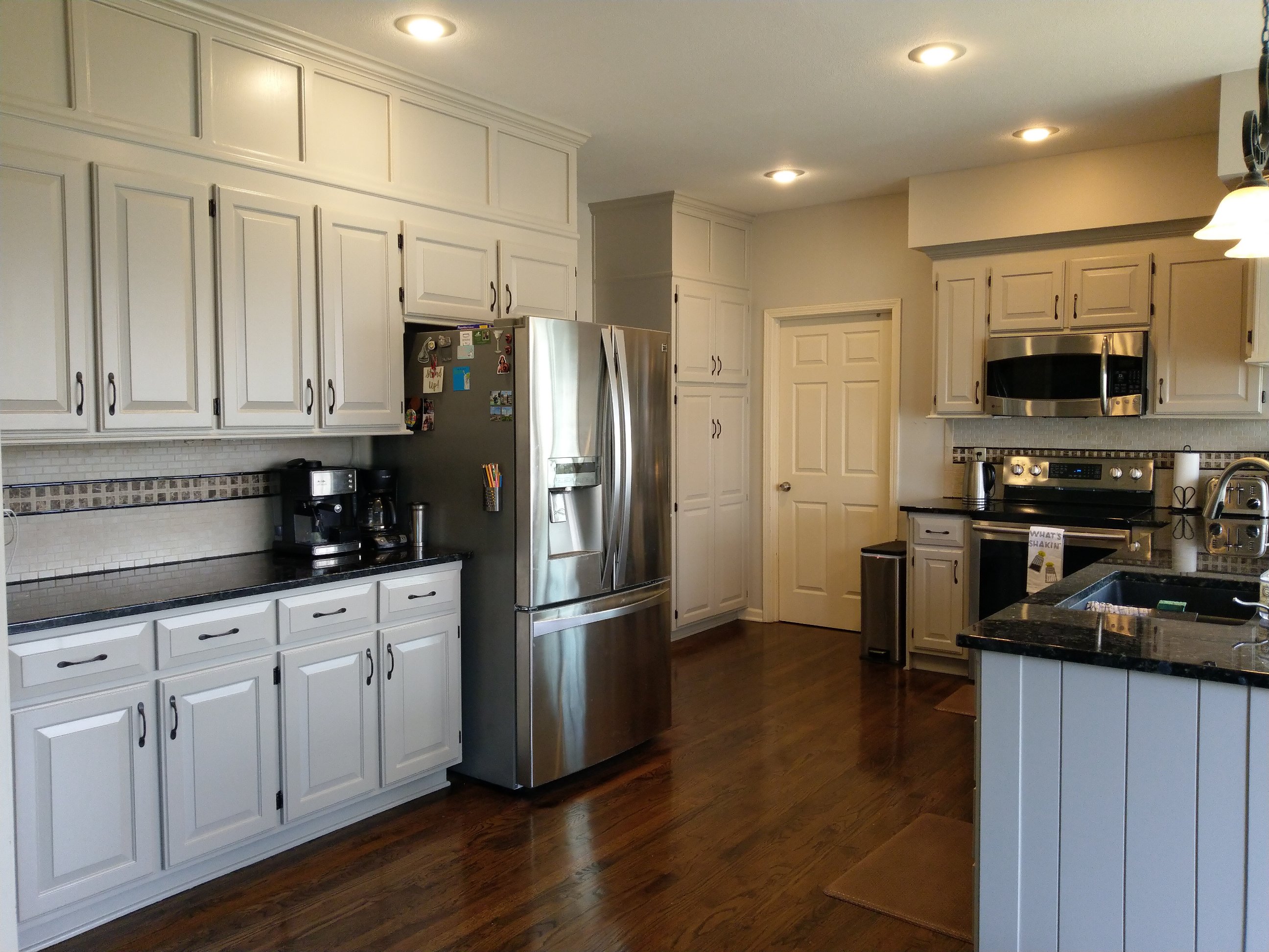 This Lenexa Ks kitchen has a modern farmhouse feel