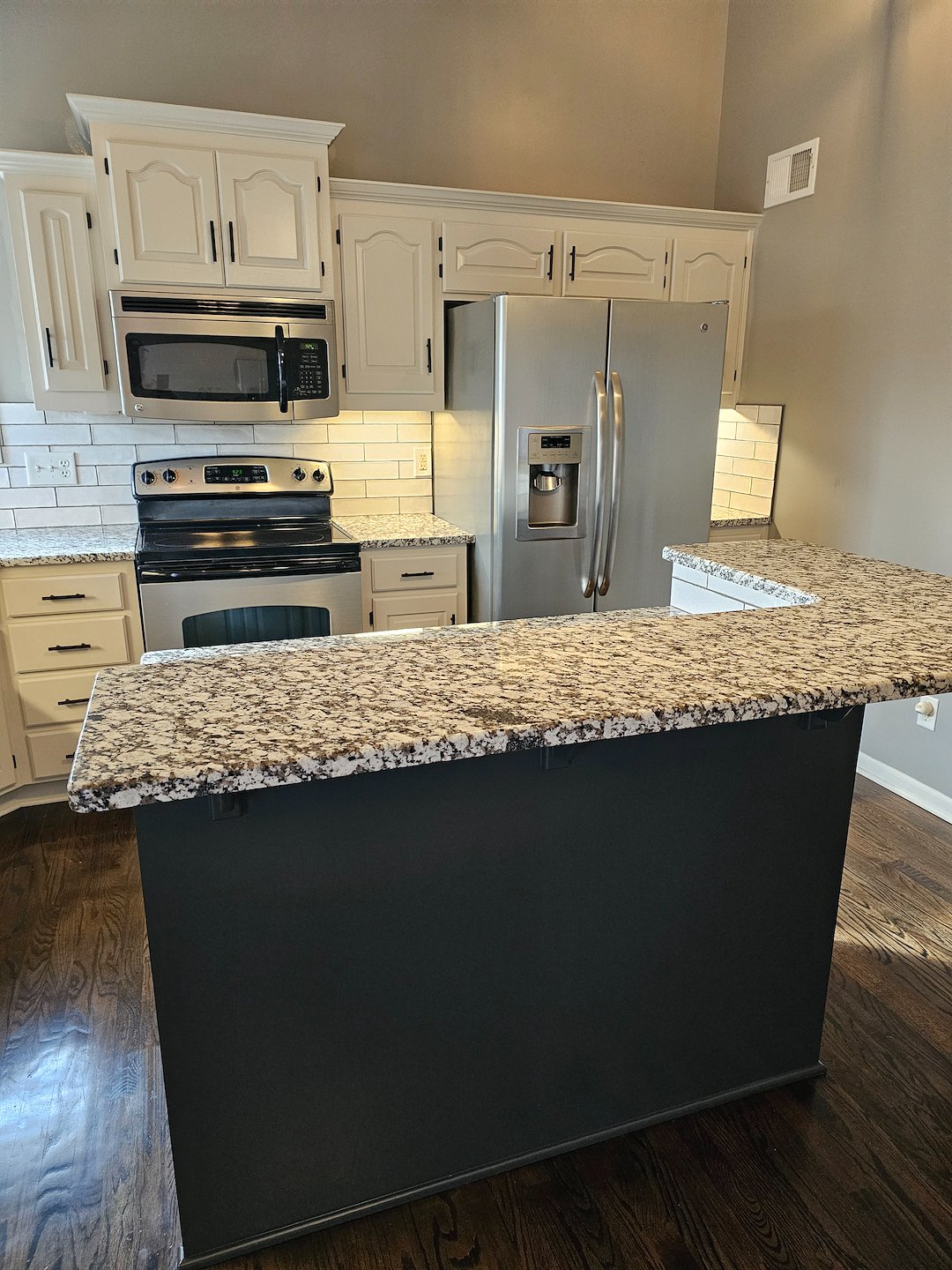 This Lenexa Ks kitchen was updated with a two toned paint scheme 